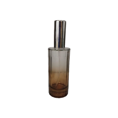 Envase de vidrio con acabado en color café degradé, diseñado para el envasado, almacenamiento y presentación de diferentes productos compatibles.